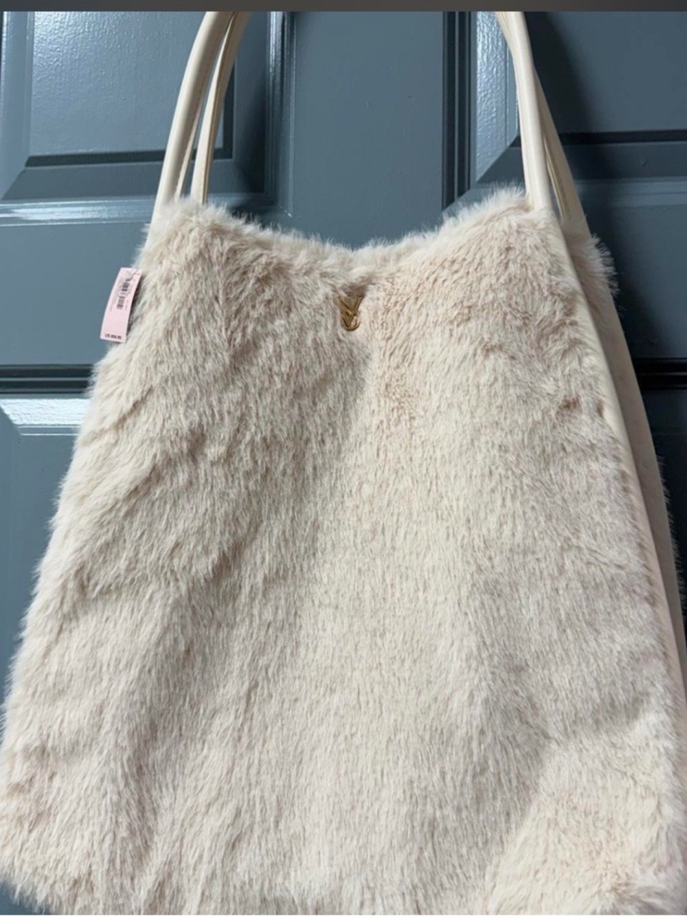 Victoria's Secret faux fur tote bag in a cream